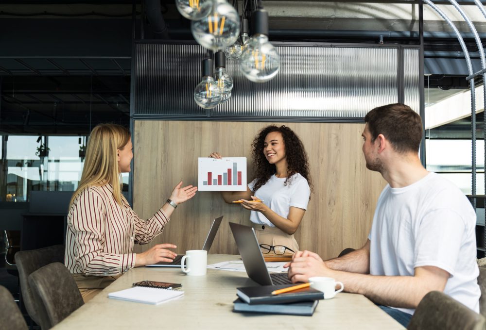 Young people working in office, coworking and office concept